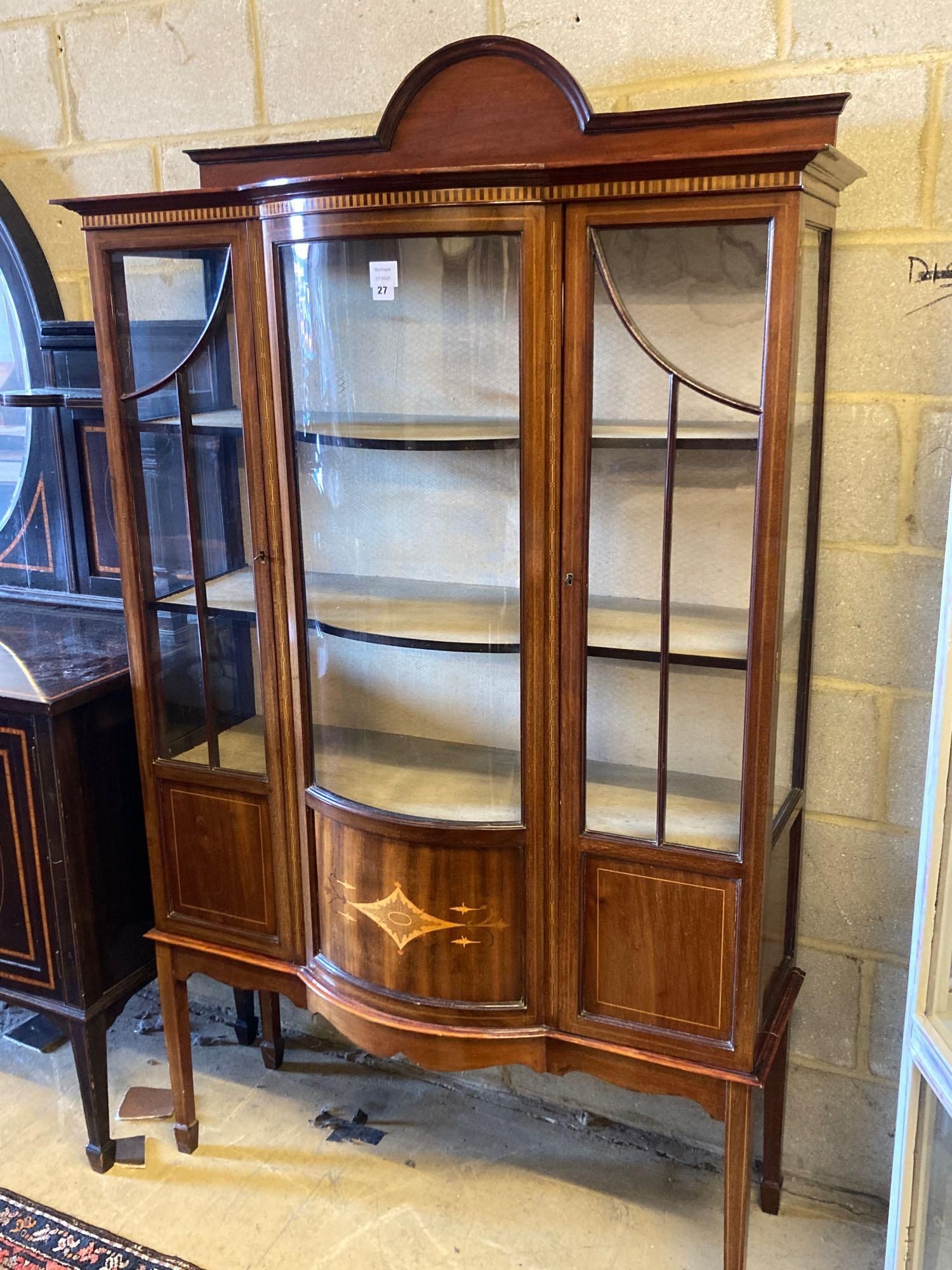 An Edwardian inlaid mahogany bow fronted china display cabinet, width 114cm height 191cm